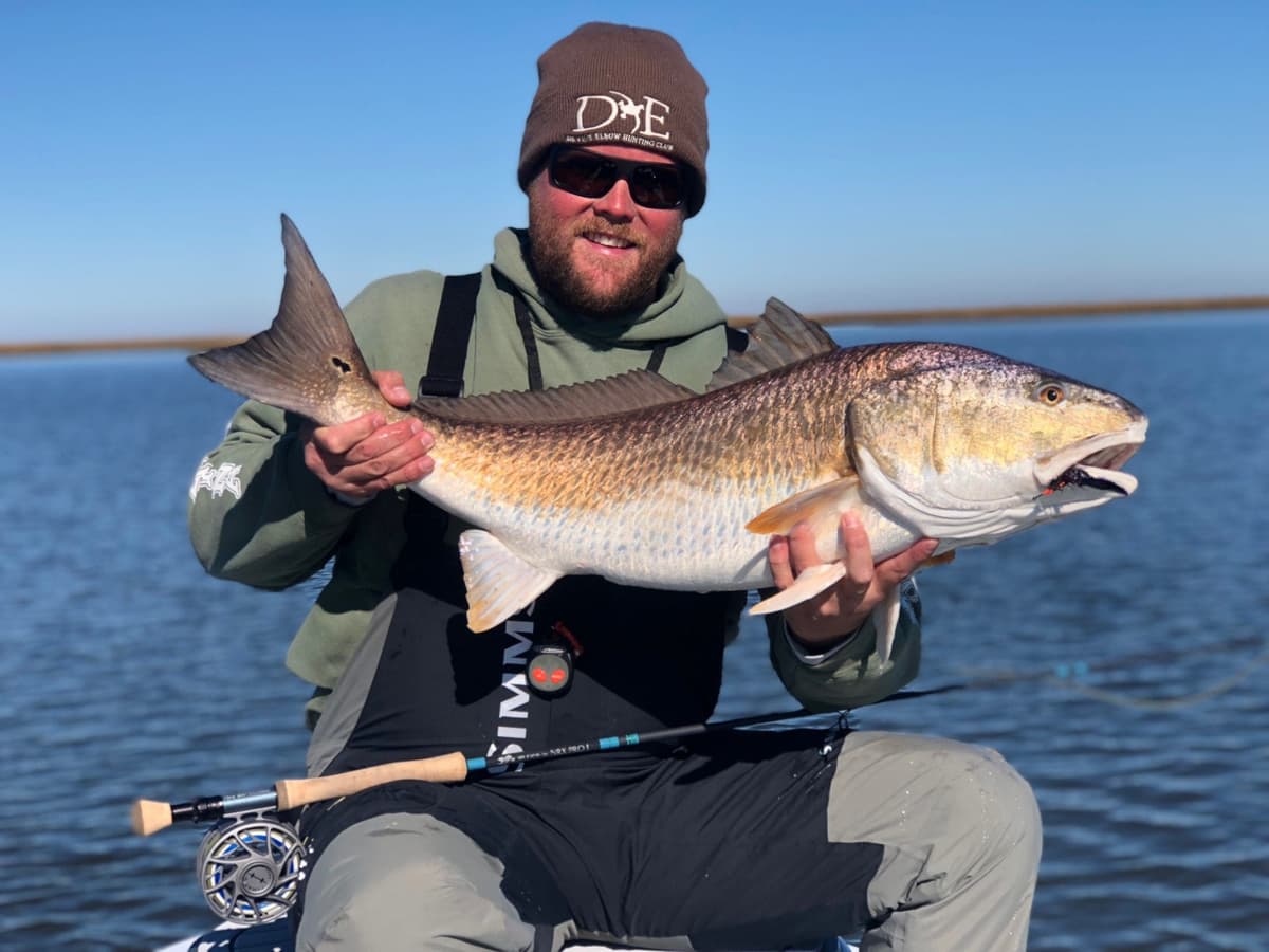 Captain Michael Pittman with a redfish